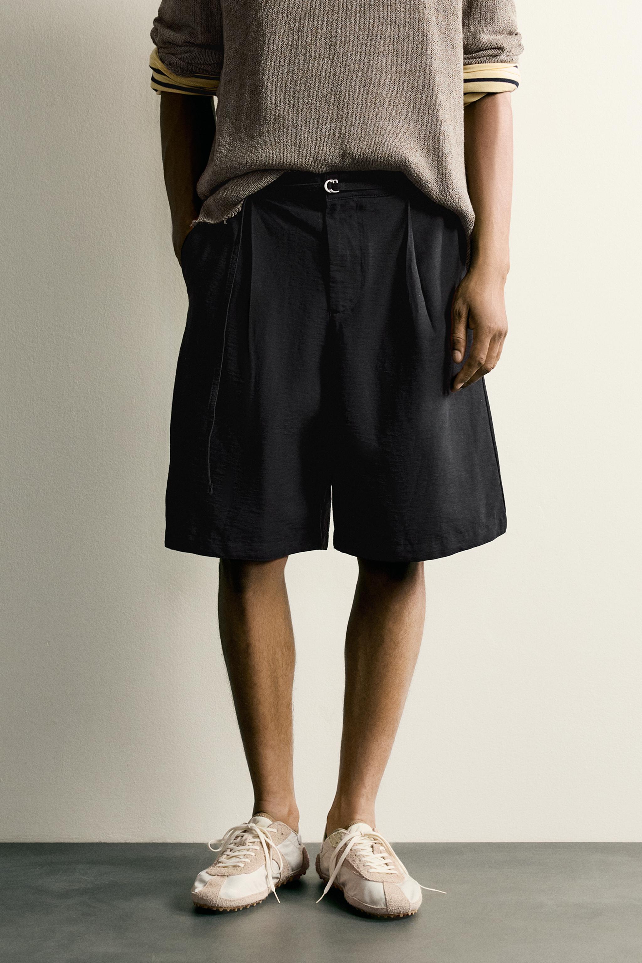 RELAXED FIT BELTED PLEATED SHORTS